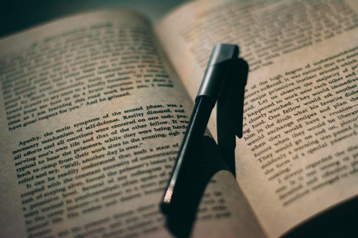 black pen on book